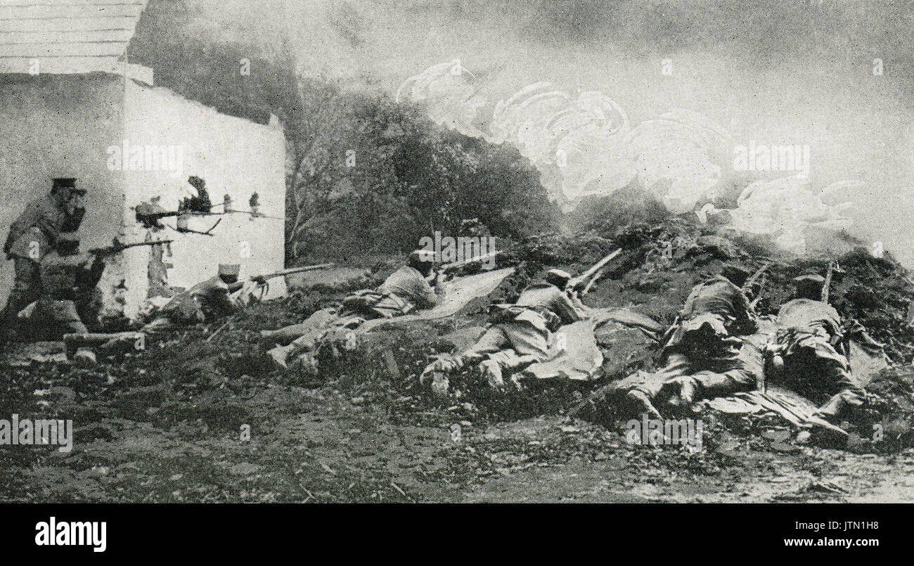 German troops firing through poison gas clouds, WW1 Stock Photo