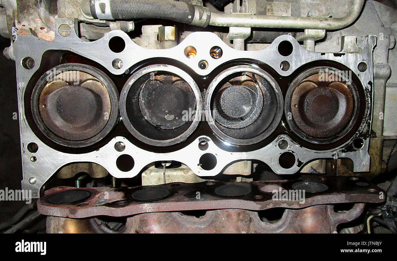 Open engine head, cylinders and pistons Stock Photo Alamy