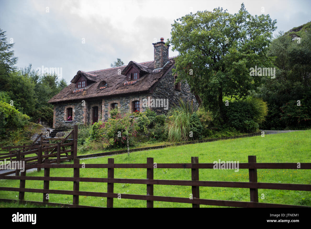 Came across this Beautiful tatched Cottage in Co. Kerry , it screamed at me to take its photo... Stock Photo