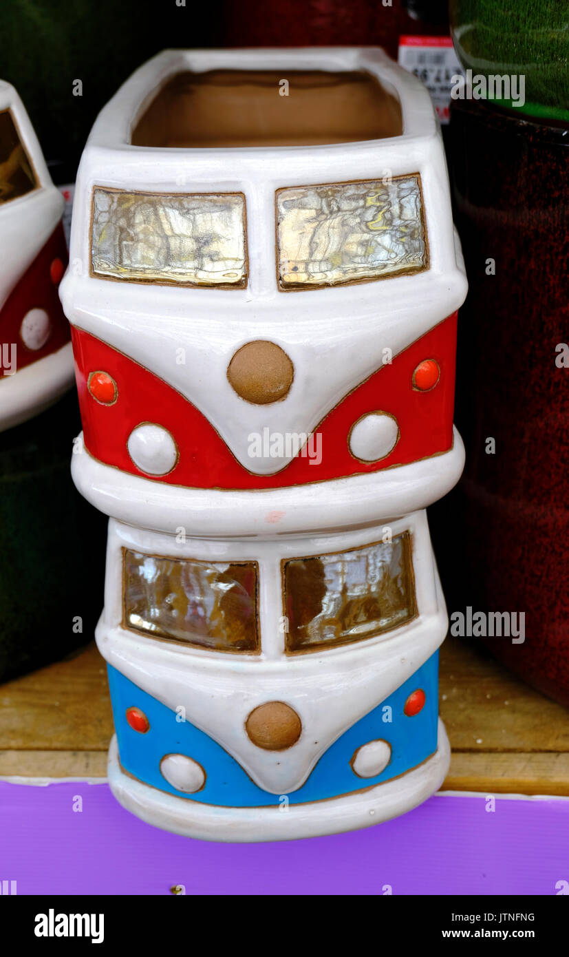 On sale in an English garden centre, ceramic VW Campervan flowerpots Stock Photo