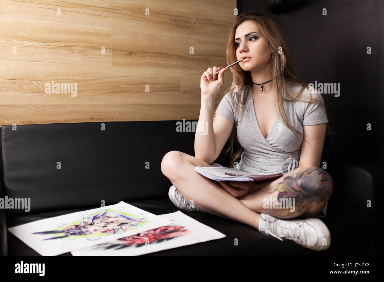 Artist painting in her workshop. Stock Photo