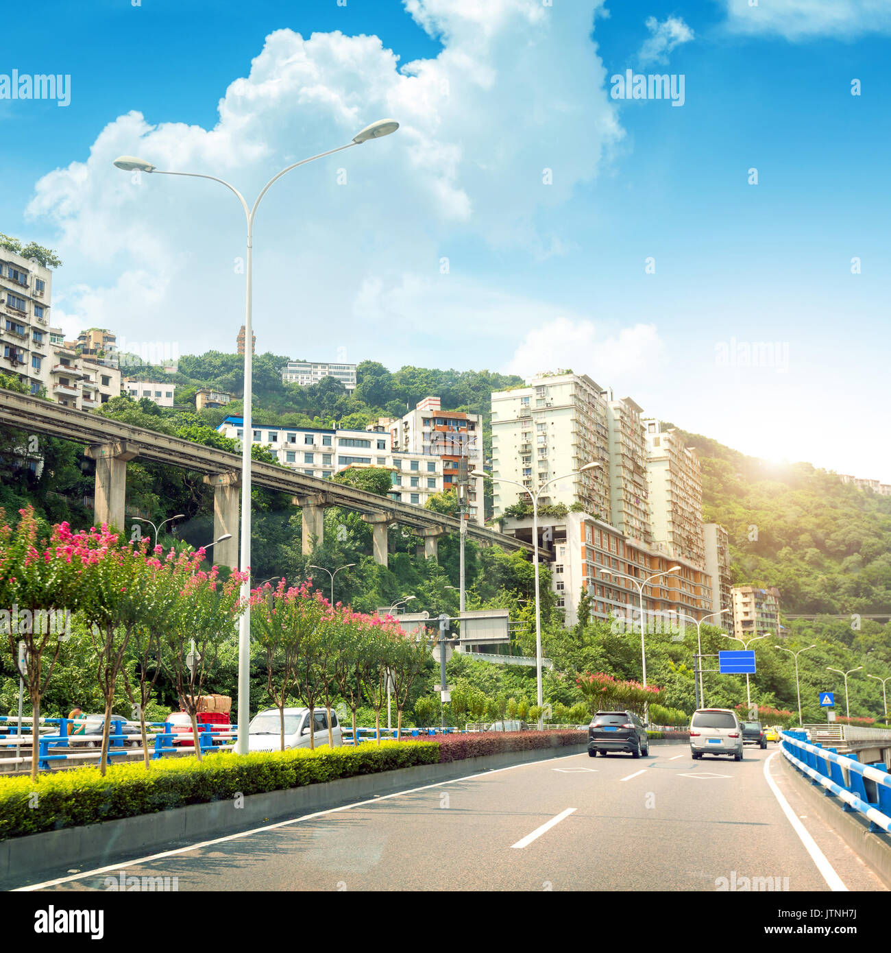 China's wonders, railroad tracks through the buildings, China's