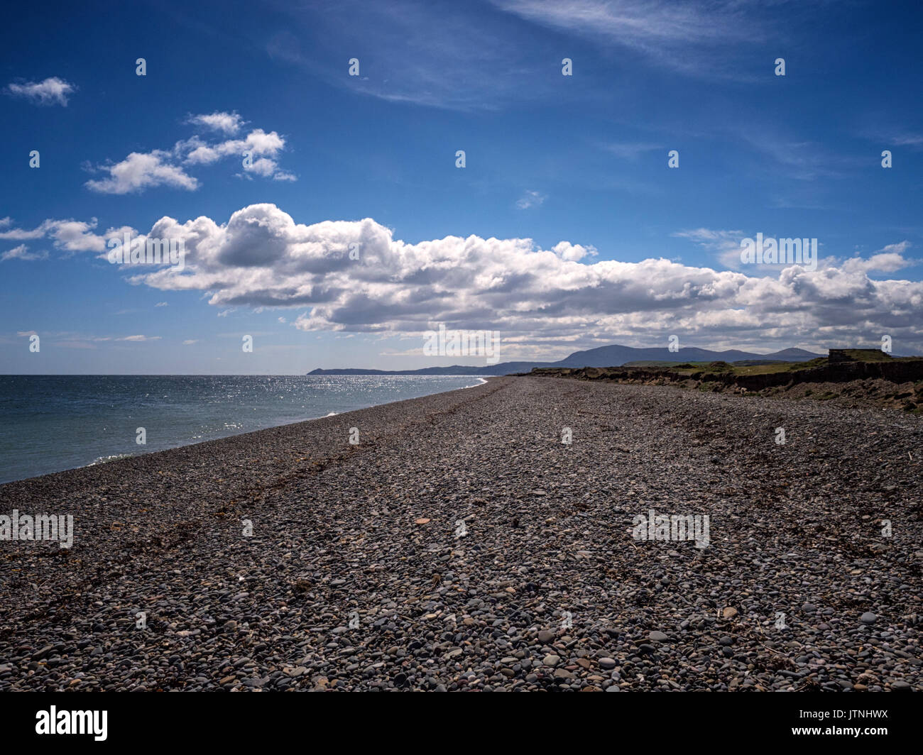 Long single beach on the northernmost point of the Isle of Man looking south and near the Point of Ayre Lighthouse Stock Photo