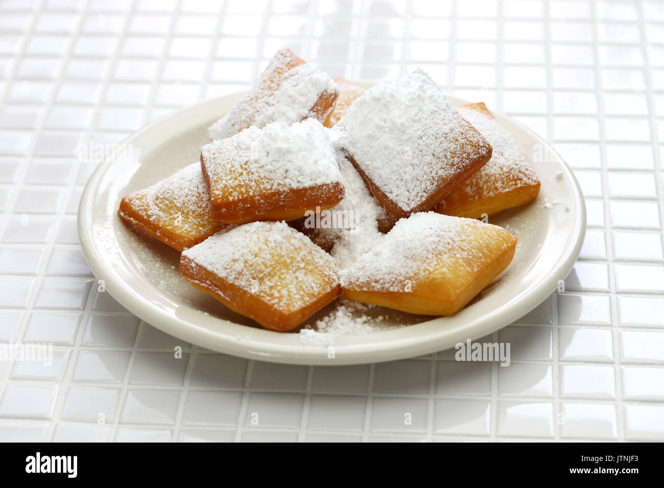 homemade new orleans beignet donuts with plenty of powdered sugar Stock ...