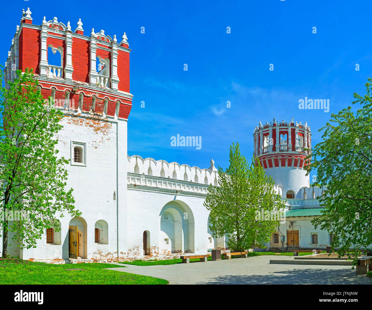 The inner courtyard of Novodevichy Convent with its unusual Nikolskaya and Tsaritsyna towers, Moscow, Russia Stock Photo