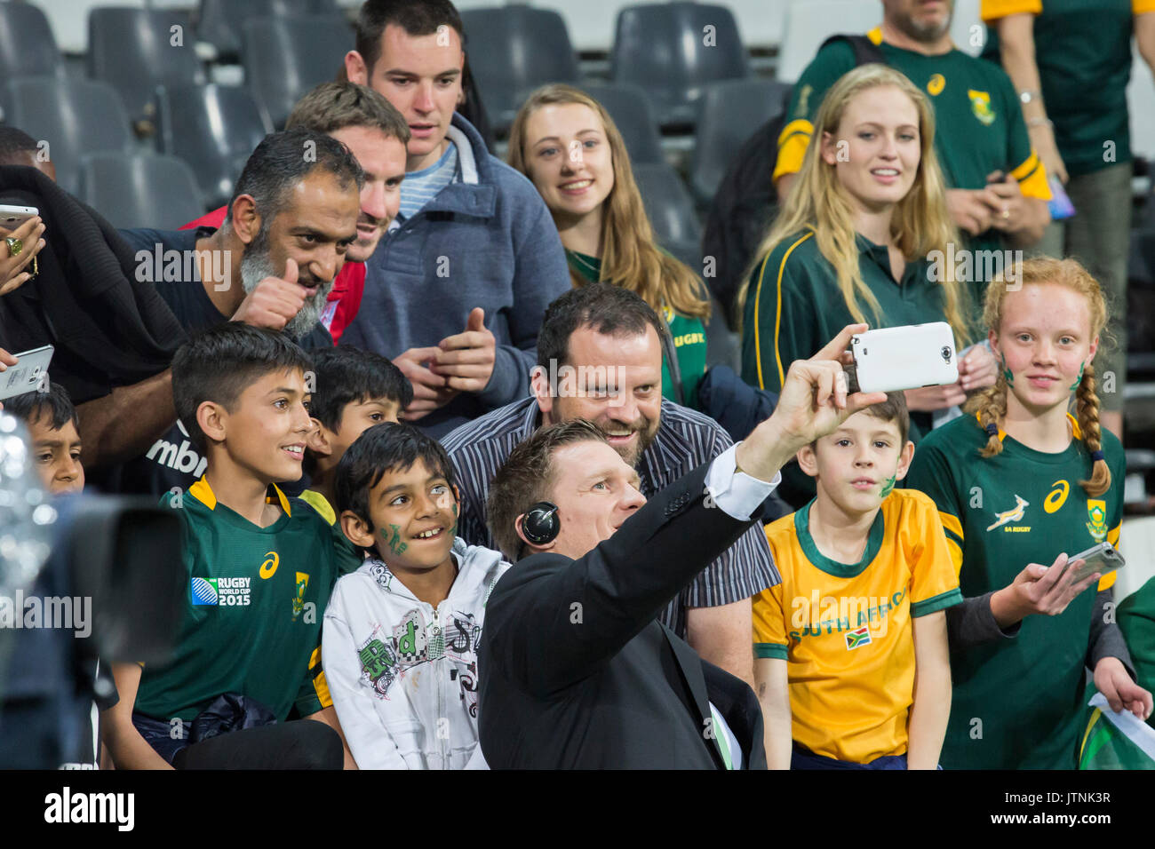 Jean de Villiers ex Springbok captain taking a selfie with fans after a rugby test Stock Photo