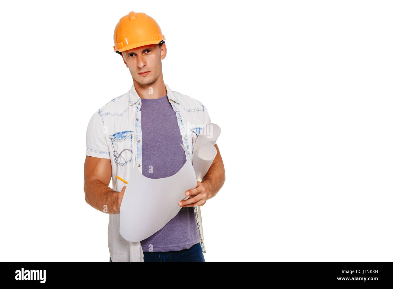 Handsom construction engineer with blueprint looking at the camera. Isolated on white. Stock Photo