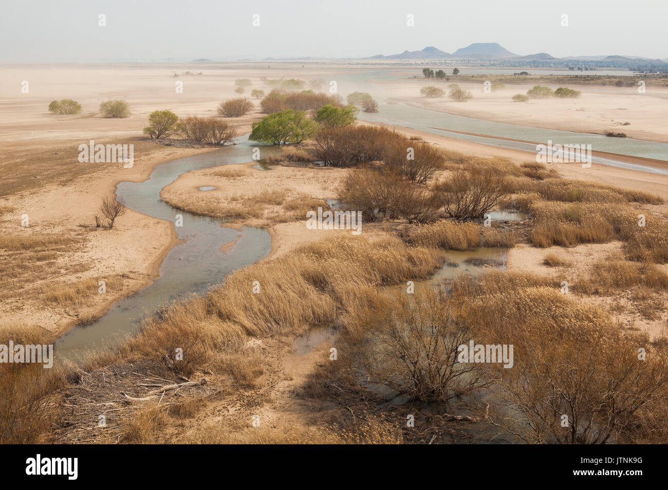 A winter dust storm creates a bleak desertlike landscape at the Orange