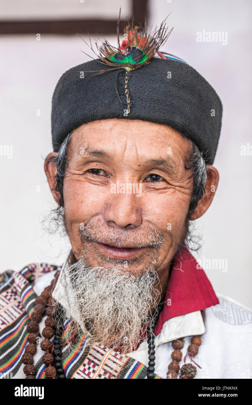 Naphe Lepcha, 70, is a Bhom Thing (A dhami/shaman who channelize nature). Sikkim, India. Stock Photo