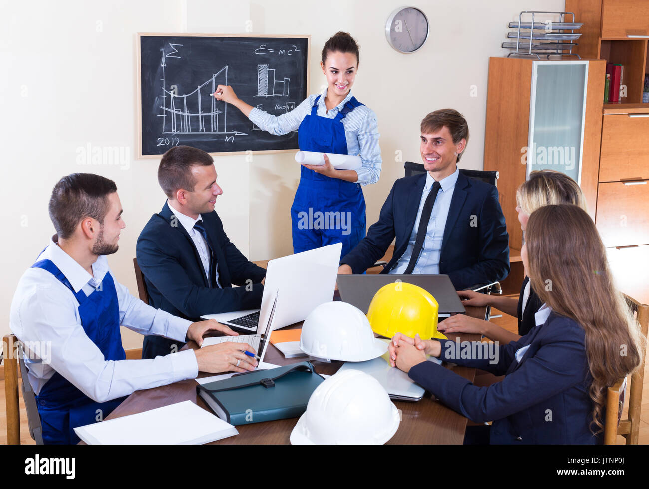 Architects, designers and constructors team at the working meeting in office. Selective focus Stock Photo