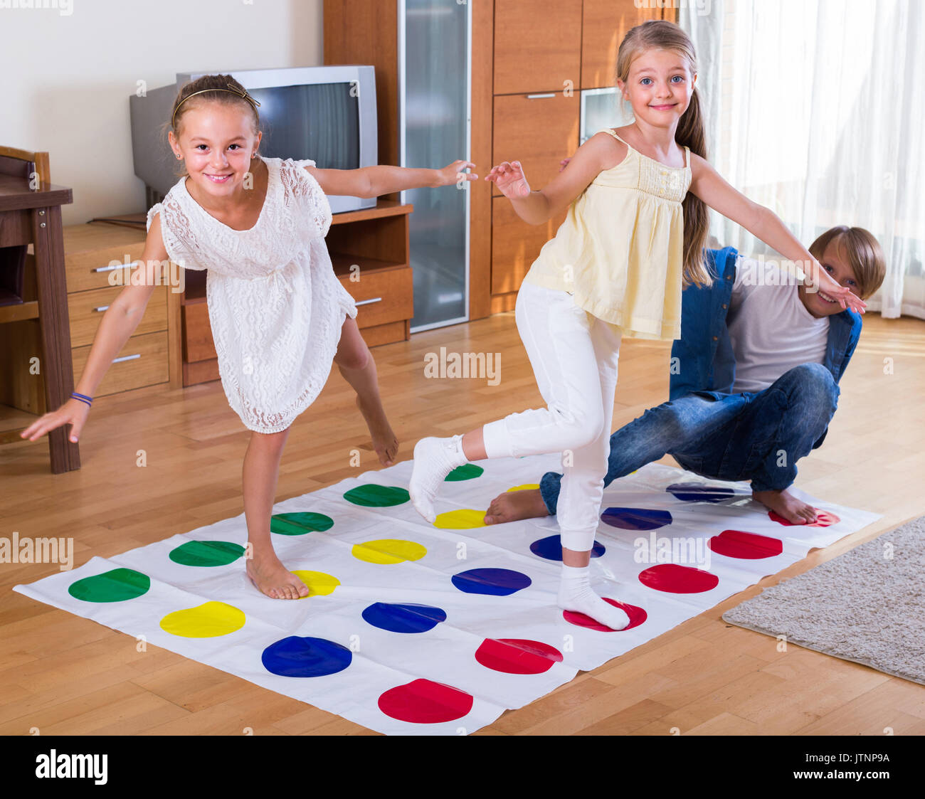 Children Playing Twister Game On Children Protection Day In Volgograd Stock  Photo - Download Image Now - iStock