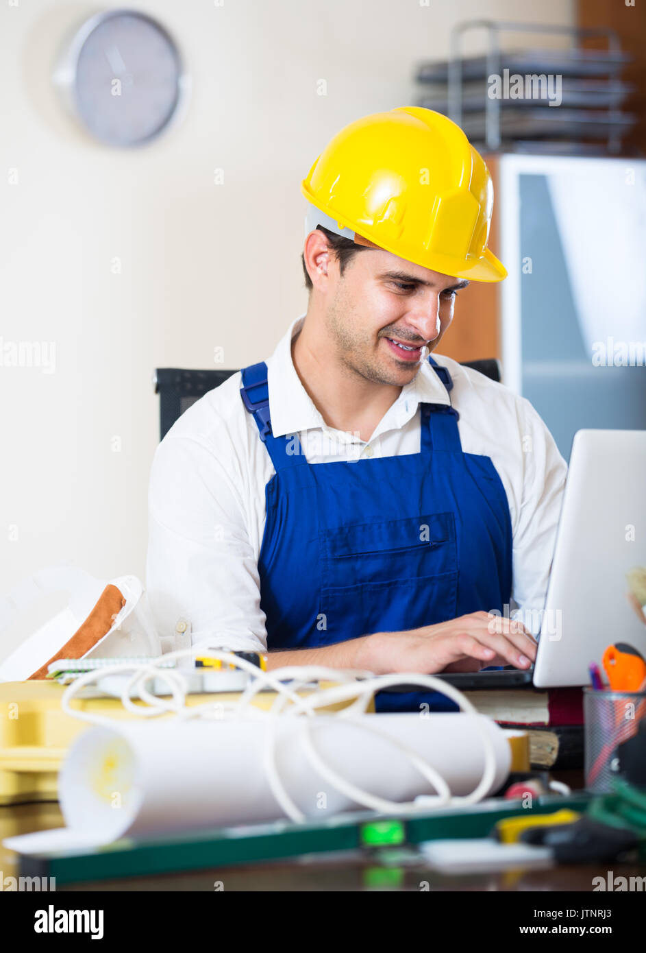 designer-constructor with tools and documentation at work place Stock ...