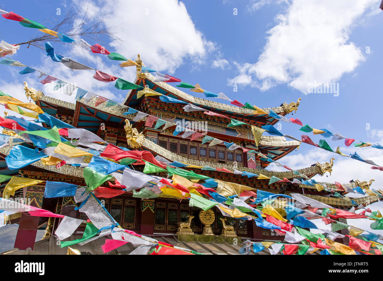 Temple,with prayer flags Zhongdian, Yunnan - China Stock Photo