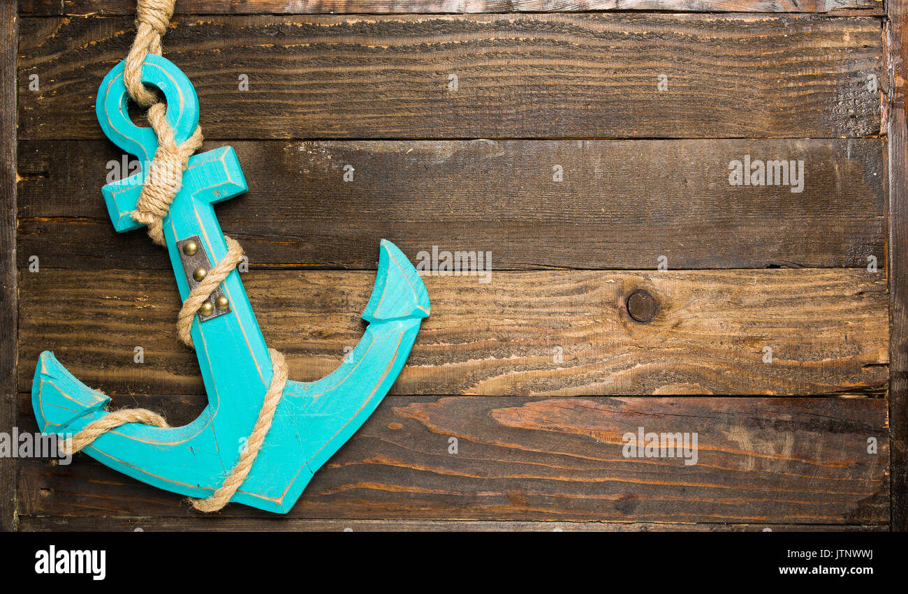 Anchor on wood background Stock Photo