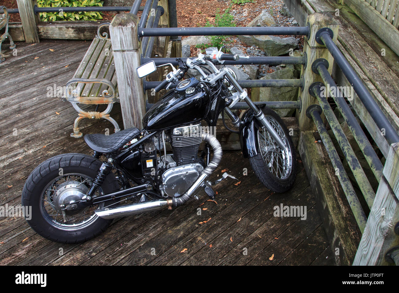 Black Classic Talon Motorcycle parked on river walk Wilmington Stock