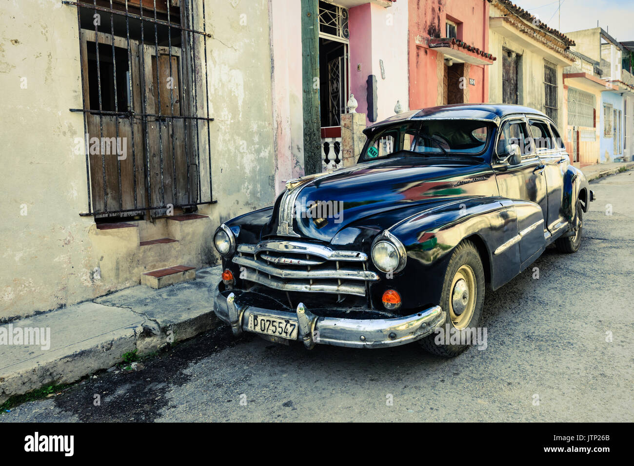 Black Pontiac Silver Streak vintage American classic car parked in street  scene, Habana, Havana, Cuba Stock Photo - Alamy