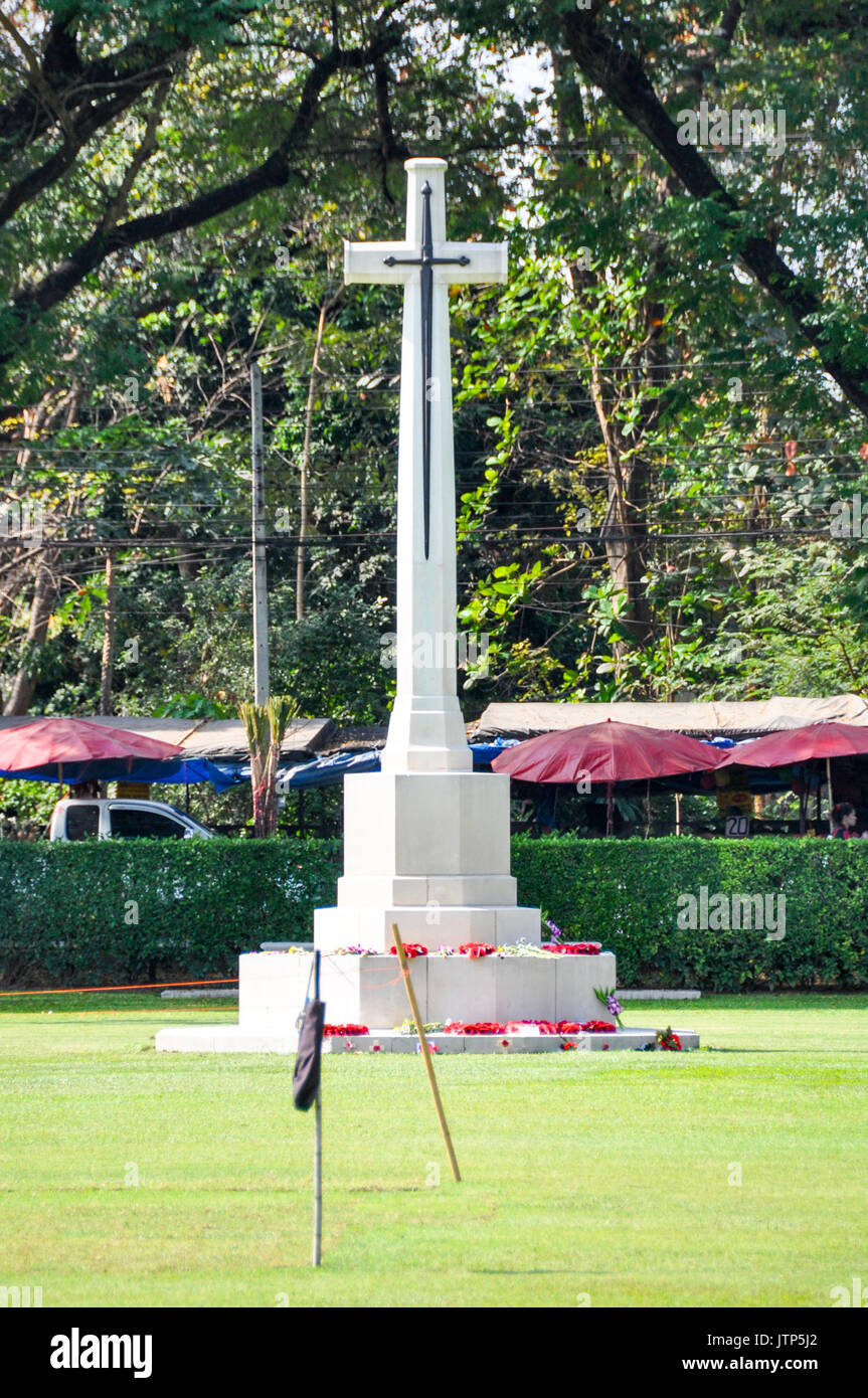 The Cross of Sacrifice memorial in the centre of the Kanchanaburi War Cemetery, Thailand. Stock Photo