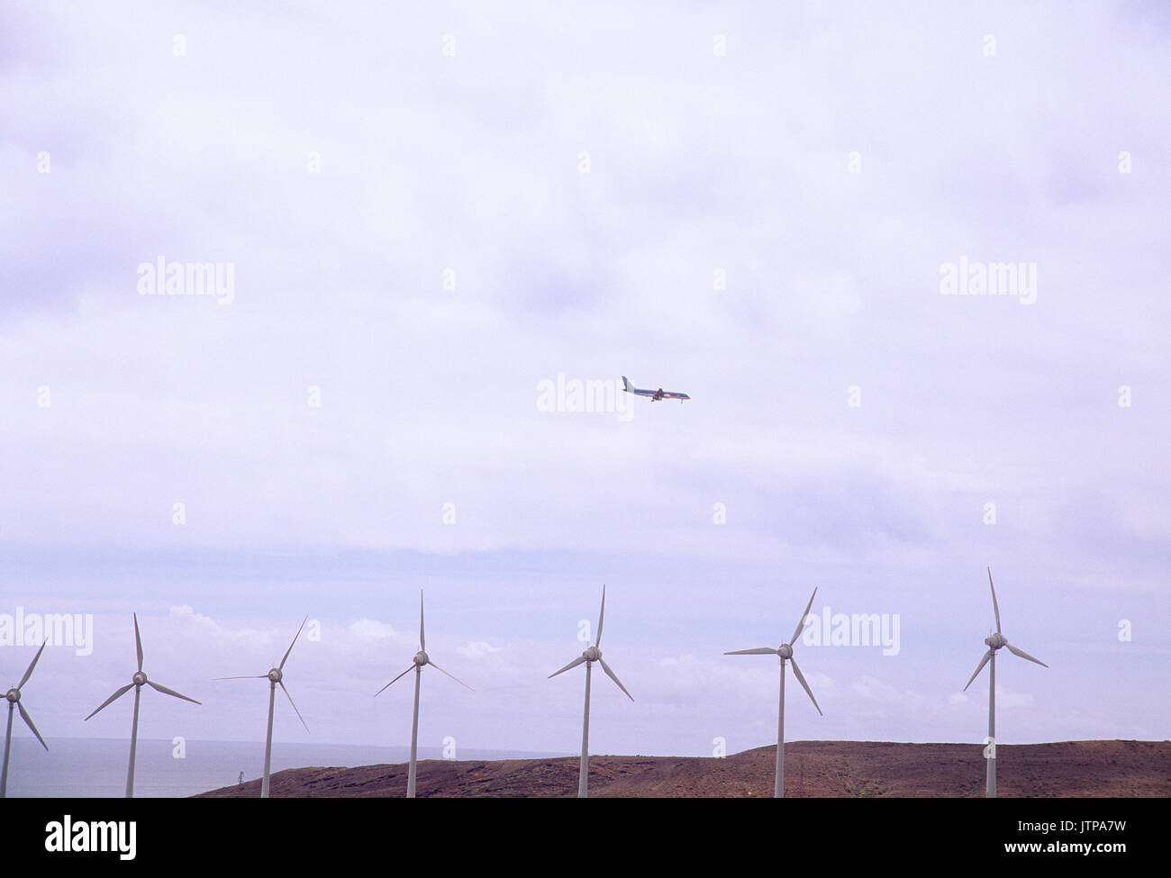 Aircraft landing and wind farm. Tenerife, Canary Islands, Spain. Stock Photo