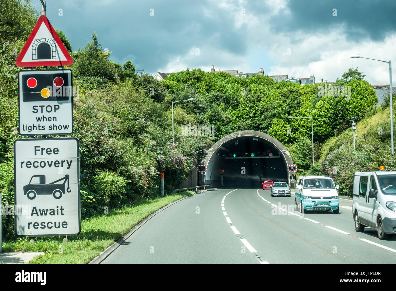 Free recovery and Await rescue sign before traffic enters a tunnel. Cornwall, England, UK. Stock Photo