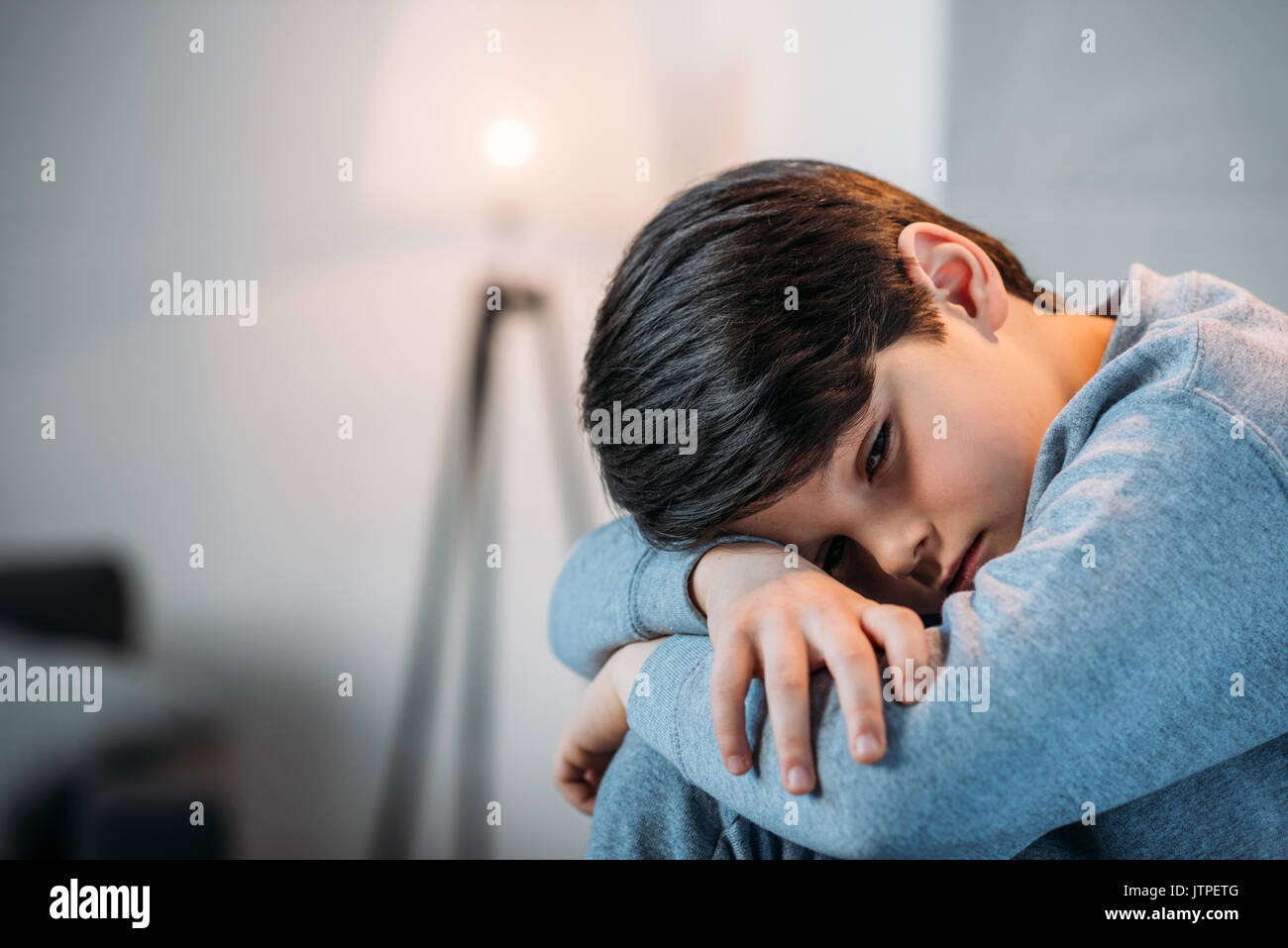 portrait of little upset thoughtful boy looking away at home Stock ...