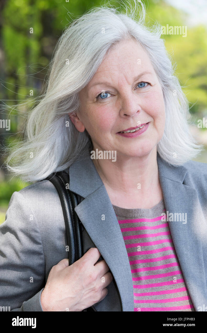 Portrait Of An Older Woman With Grey Hair Stock Photo 152931271