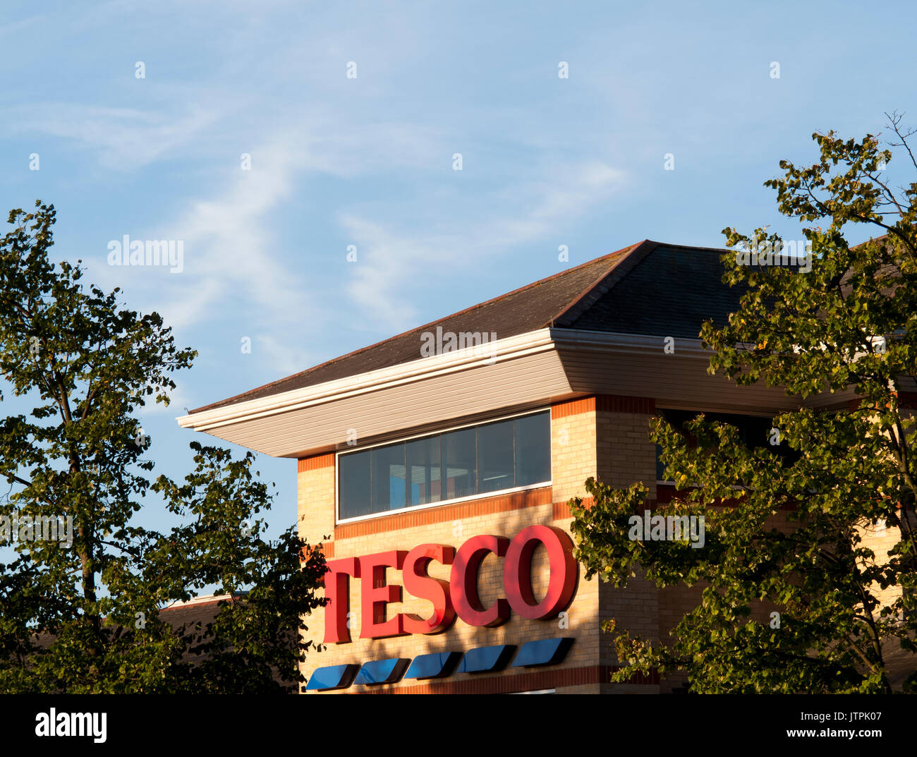 Tesco Extra supermarket name over store entrance, company founded by