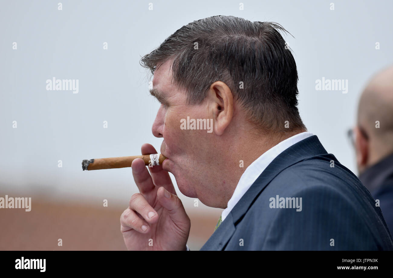 Puffing a cigar hires stock photography and images Alamy