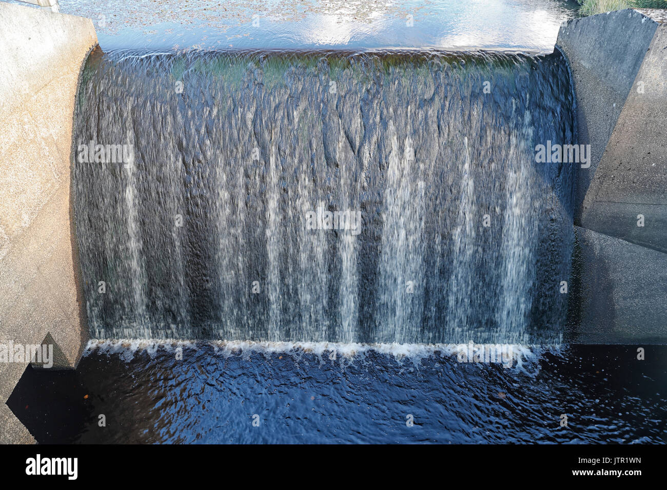 Weir at Grimwith reservoir at the southern inflows from a pond Stock