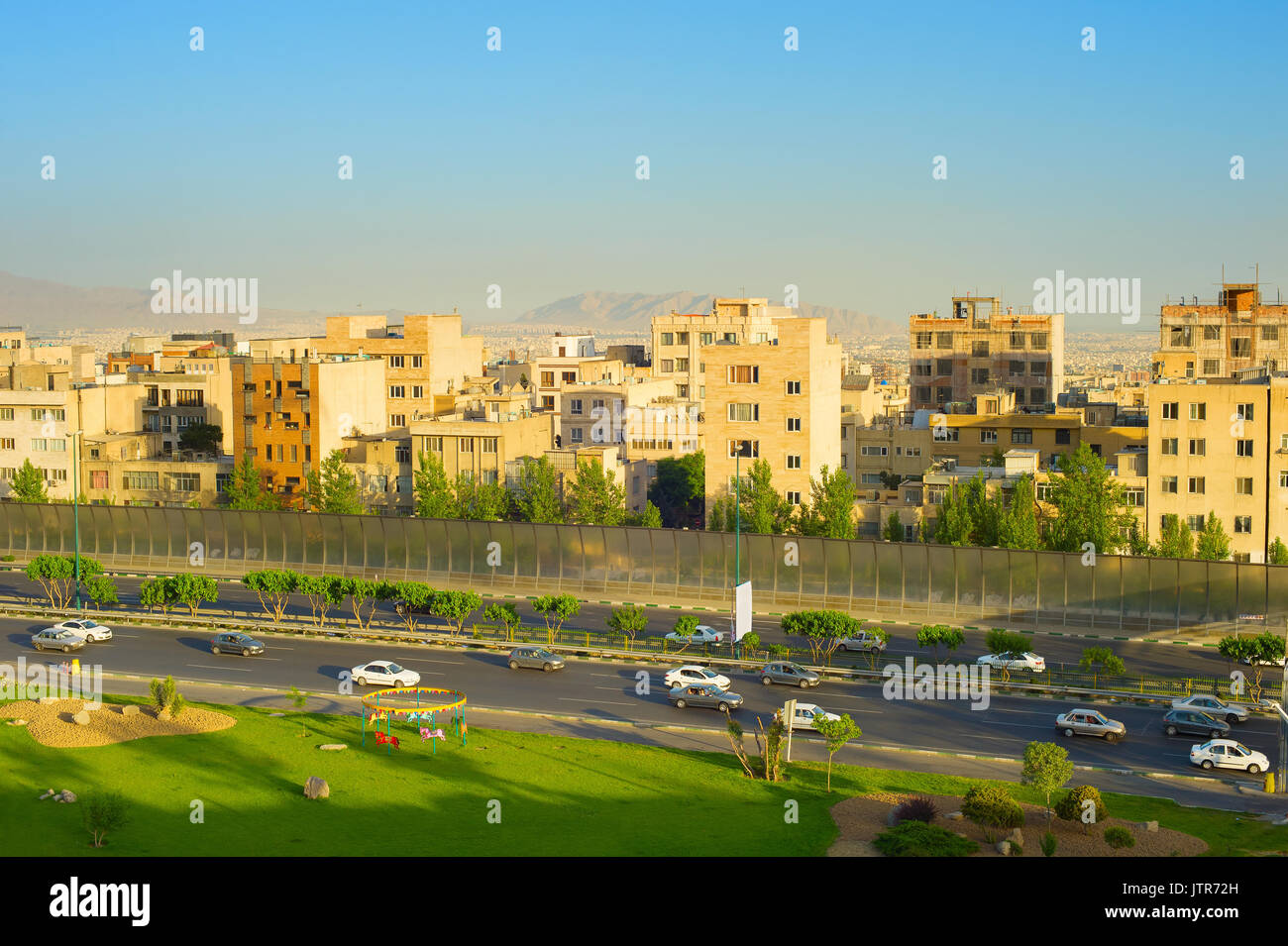 Cars on highway in Tehran at sunset. Iran Stock Photo