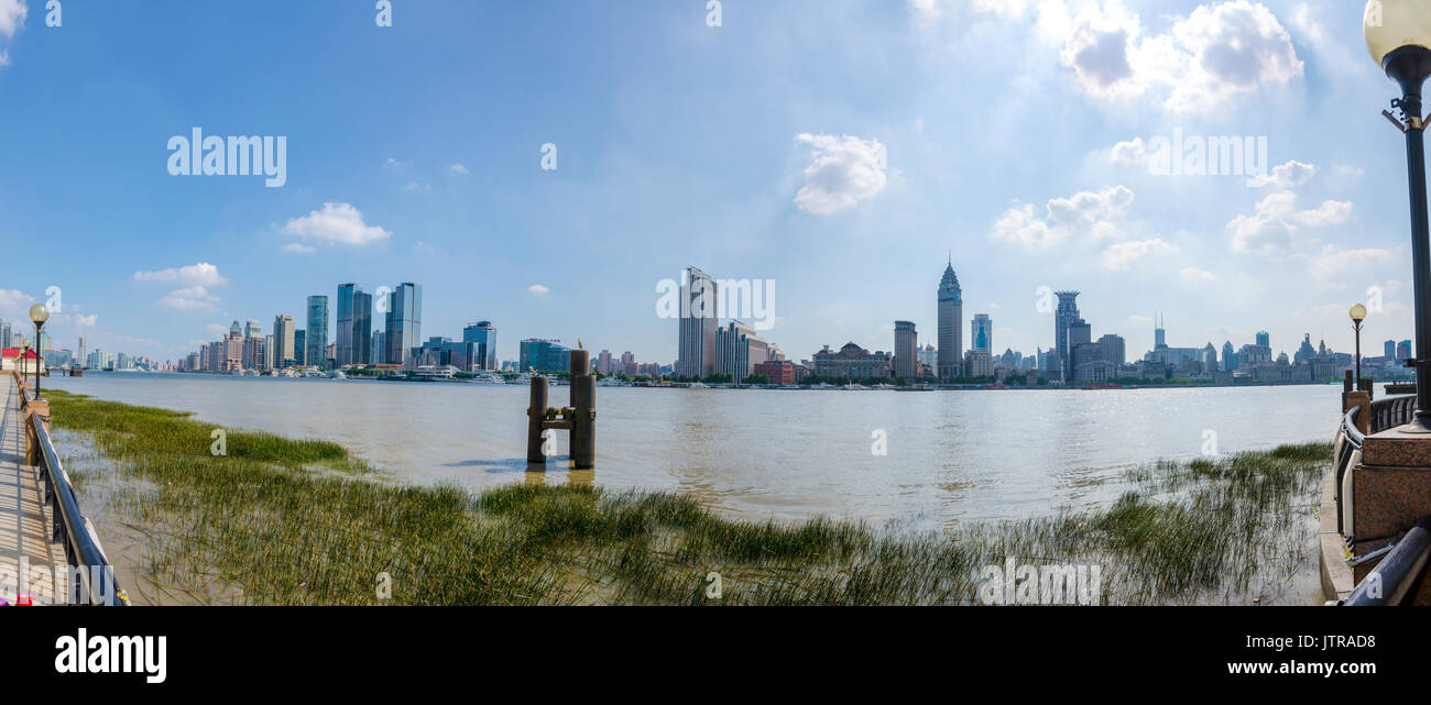 Looking across the Huangpu River in Shanghai, China  at skyscrapers on the other side. Stock Photo
