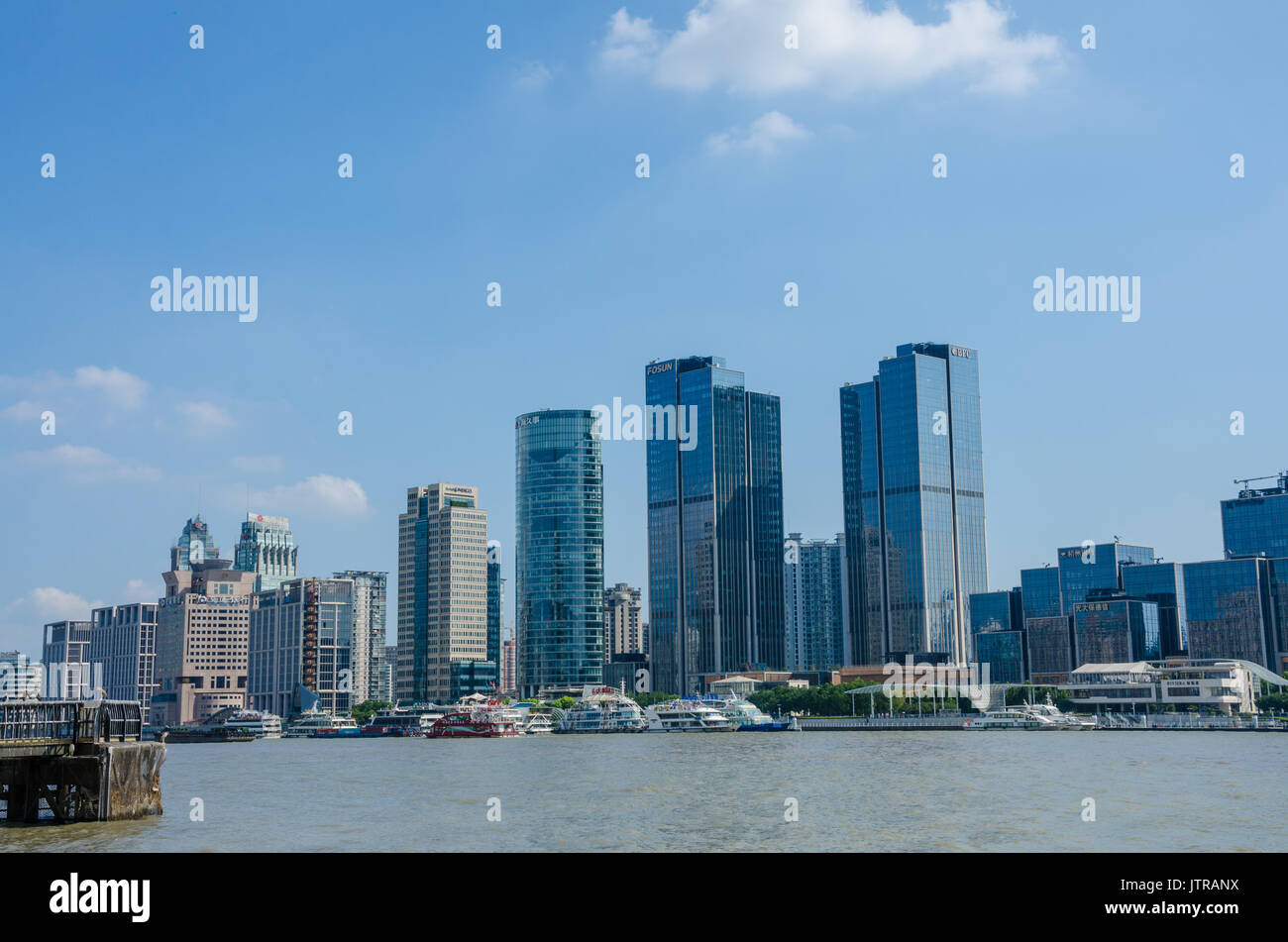 Looking across The River Huangpu at the skyscrapers on the opposite bank. Stock Photo