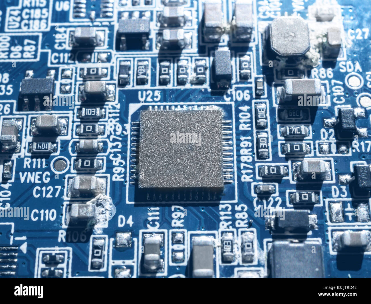 Electronic circuit chip board mother board computer CPU close up. Stock Photo