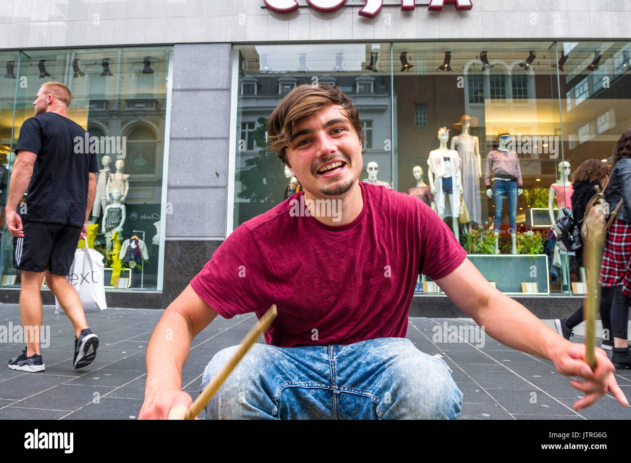 Male busking in the busy shopping streets of Liverpool using plastic ...