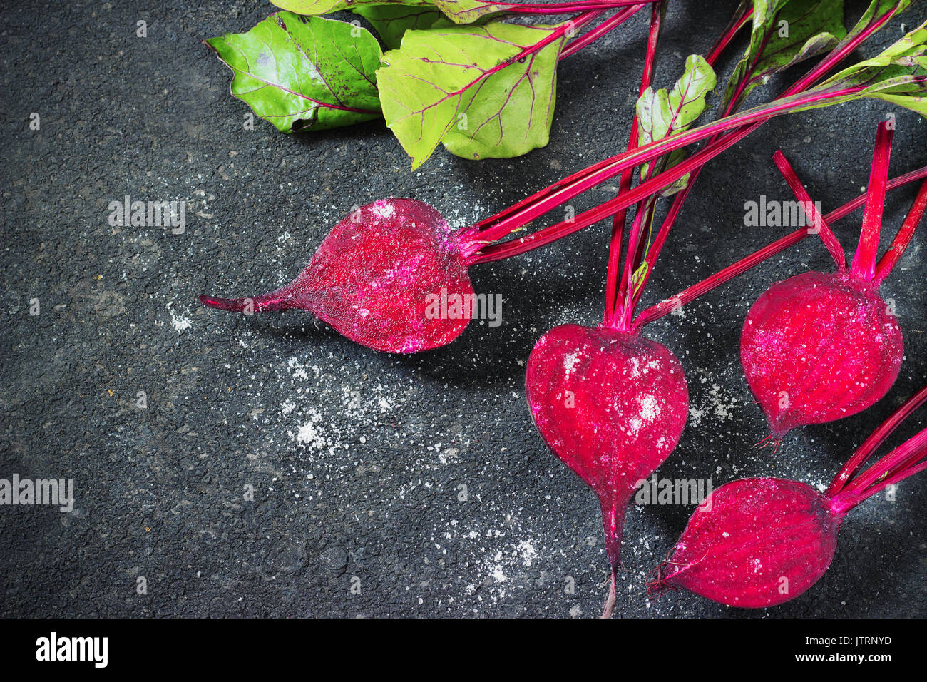 Fresh beets on a black background for frying in the pan Stock Photo Alamy