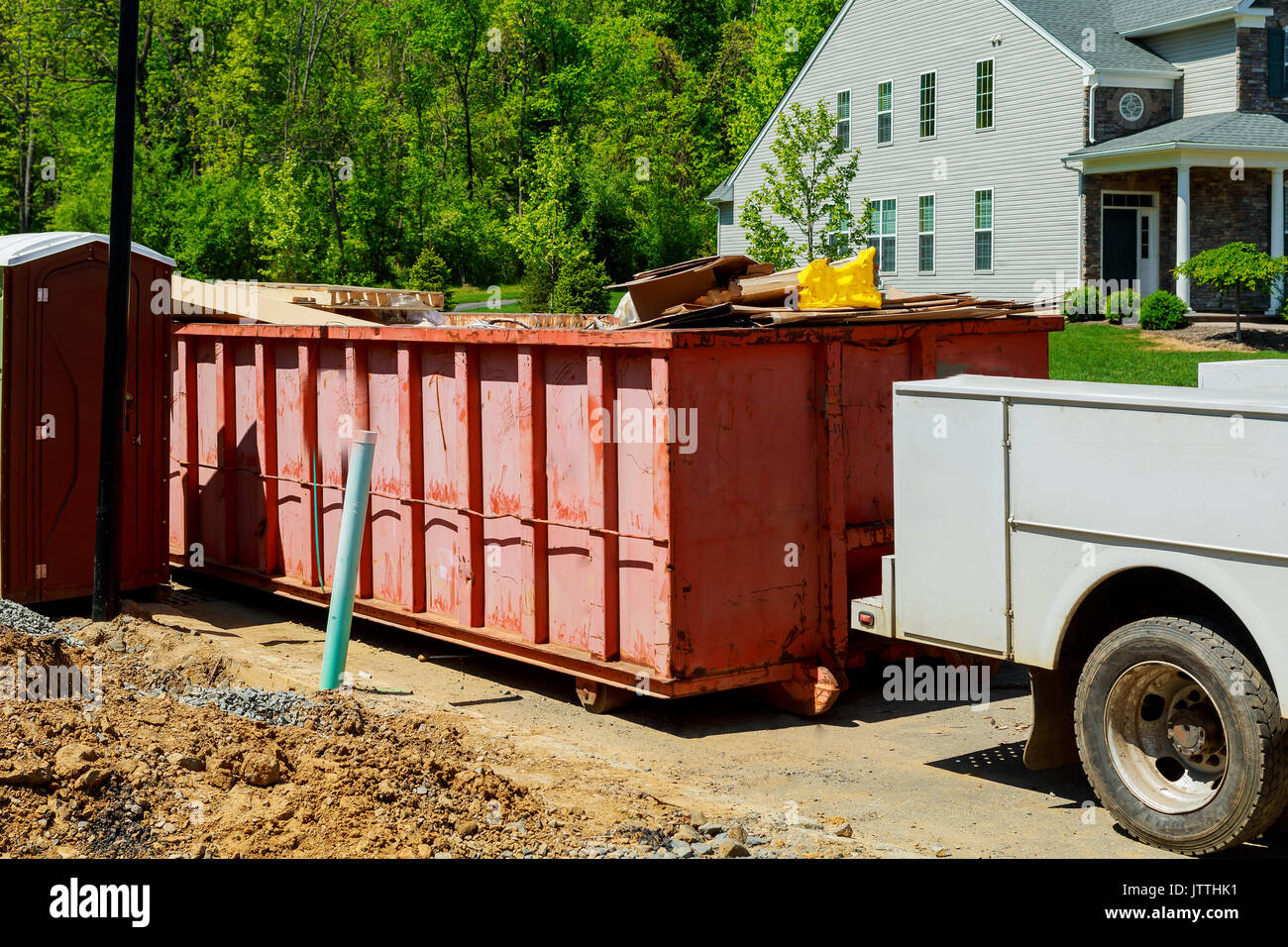 garbage containers near the new home, Red containers, recycling and