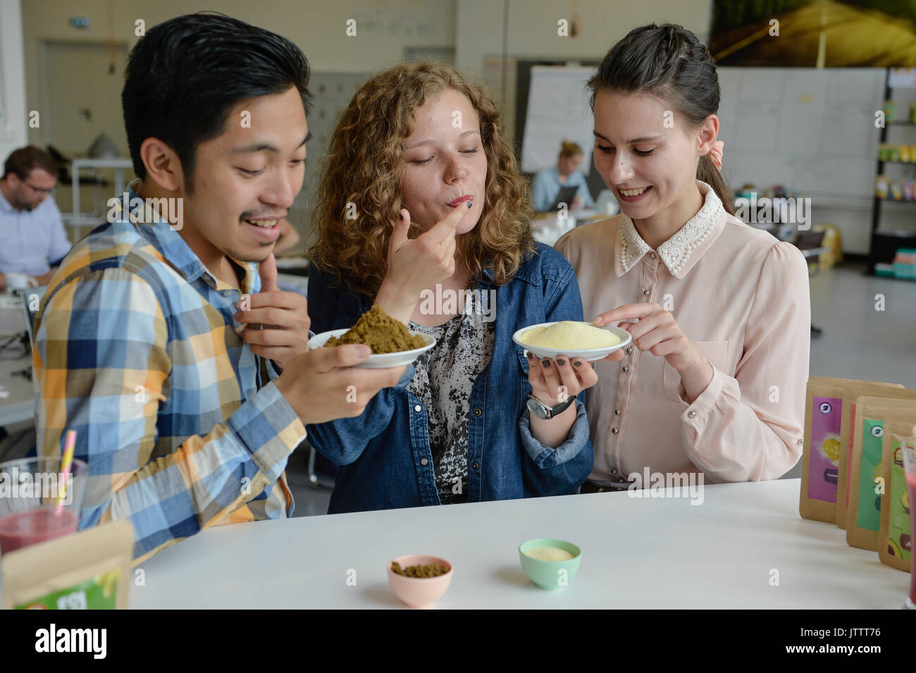 Bremen, Germany. 27th July, 2017. L-R: Gerald Perry Marin, Ada Batazy and Vita Jarolimkova in the start-up centre Kraftwerk in Bremen, Germany, 27 July 2017. The trio are the minds behind FoPo (an abbreviation of Food Powder), a company that processes fruit from farms in the Philippines, Israel and Kenya into freeze-dried powders which can then be shipped to Germany more conveniently. Photo: Karsten Klama/dpa/Alamy Live News Stock Photo