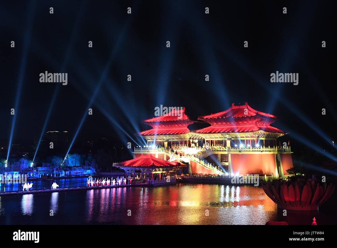 (170810) -- ZHENGZHOU, Aug. 10, 2017 (Xinhua) -- An on-water performance is staged to reproduce the historical prosperity of Kaifeng City in Northern Song Dynasty (960-1127 AD), central China's Henan Province, Aug. 9, 2017. Kaifeng served as capital of different dynasties in history. (Xinhua/Zhu Xiang) (xzy) Stock Photo