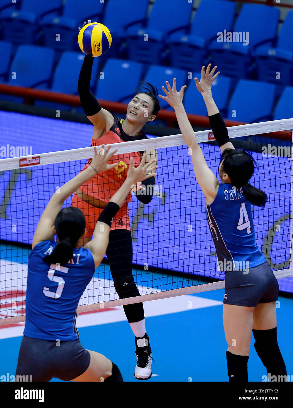 Laguna Province, Philippines. 10th Aug, 2017. Jin Ye of China (C) competes against Erika Araki (L) and Risa Shinnabe of Japan during their preliminary round match in the 2017 Asian Women's Volleyball Championship in Laguna Province, the Philippines, Aug. 10, 2017. Japan won 3-0. Credit: Rouelle Umali/Xinhua/Alamy Live News Stock Photo