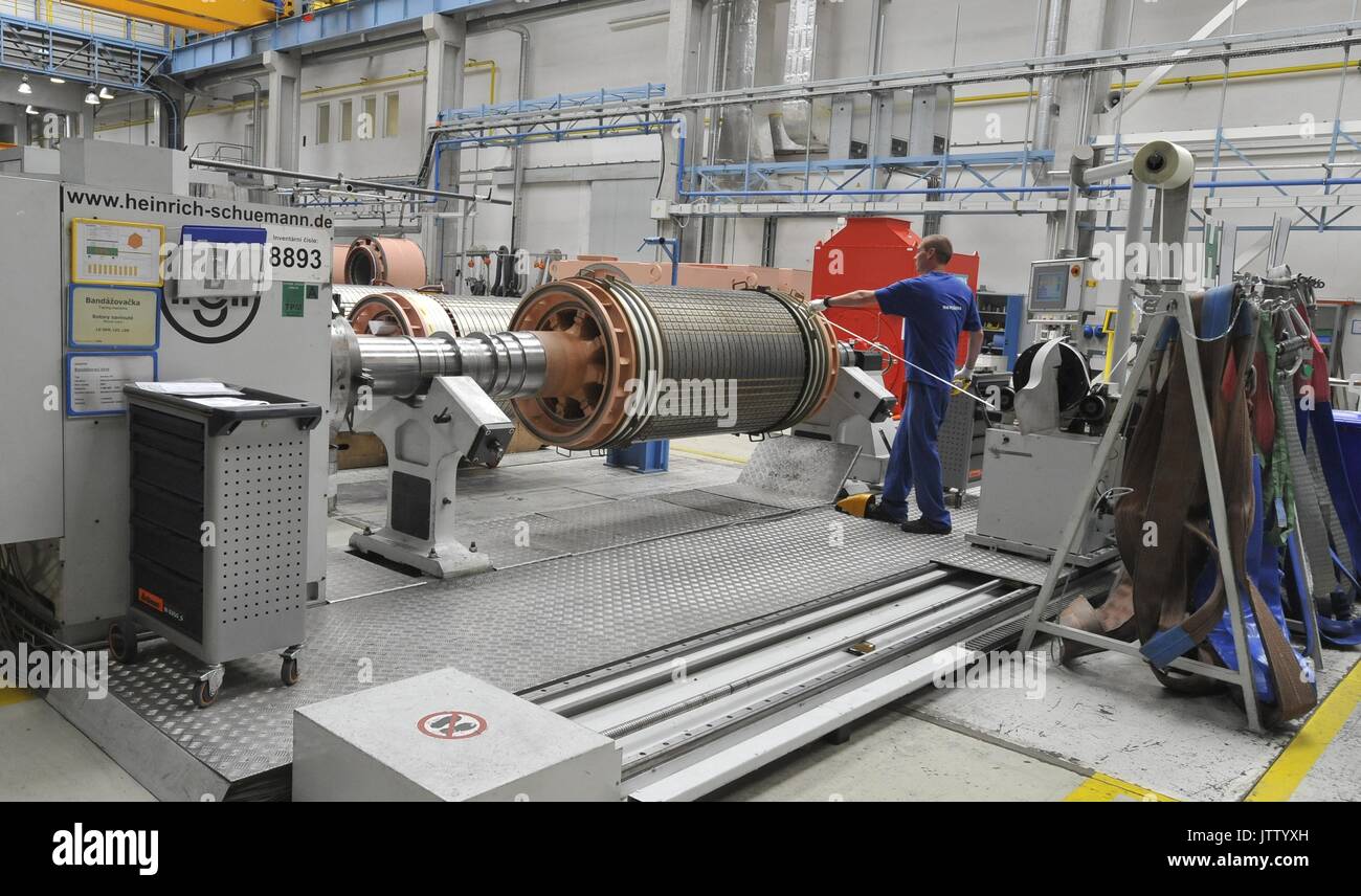 Employee works during the visit of Czech Prime Minister Bohuslav Sobotka in the production plant Siemens Electric Machines, which produces electric motors and generators, in Drasov, Brno region, Czech Republic, on August 10, 2017. (CTK Photo/Igor Zehl) Stock Photo