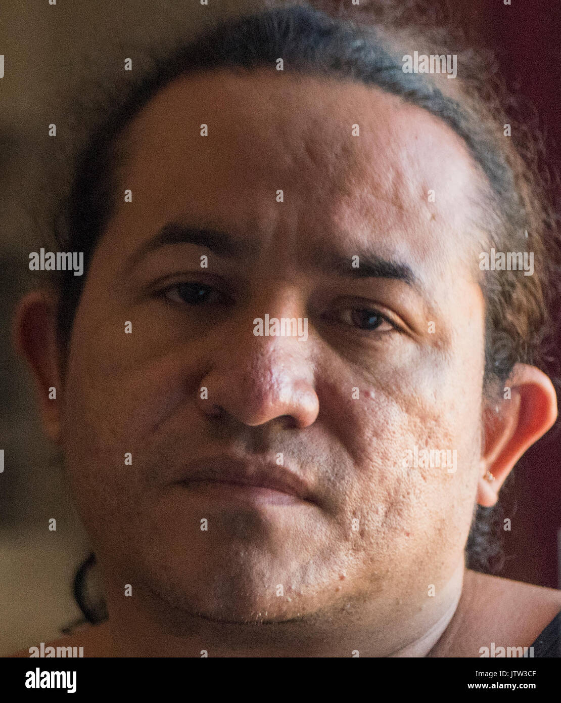 West Palm Beach, Florida, USA. 9th Aug, 2017. Pedro Cruz, 36, is pictured at his aunt's home in Boynton Beach, Fla., on Wednesday, August 9, 2017. Cruz's cousin, 22-year-old Juan Cruz, was killed August 6 defending Pedro during an altercation outside a Lake Worth restaurant. Credit: Andres Leiva/The Palm Beach Post/ZUMA Wire/Alamy Live News Stock Photo