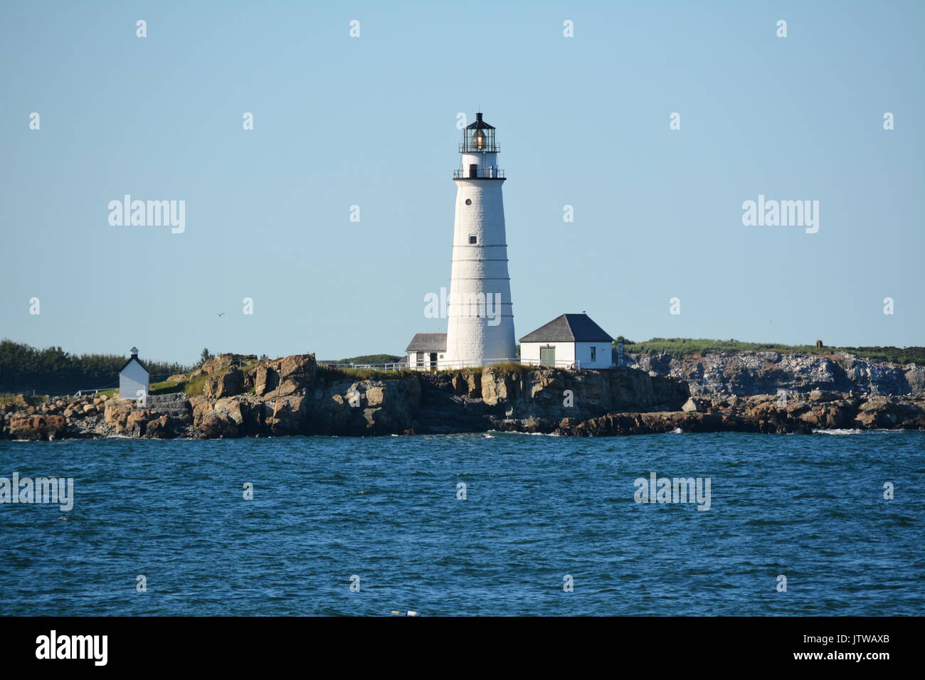 The historic Boston Light on Little Brewster Island in Boston Harbor ...