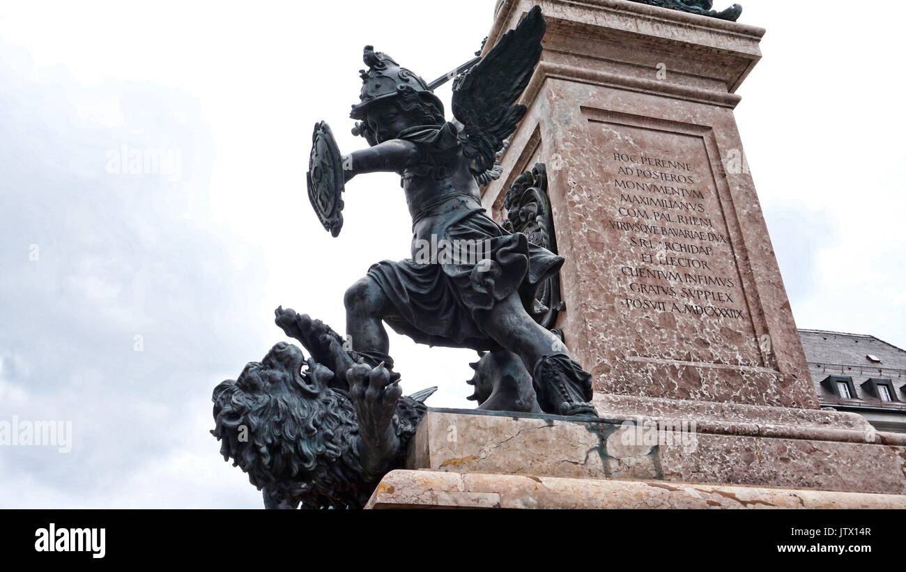 Putto Statue fighting with animal at Marienplatz in Munich, Germany Stock Photo