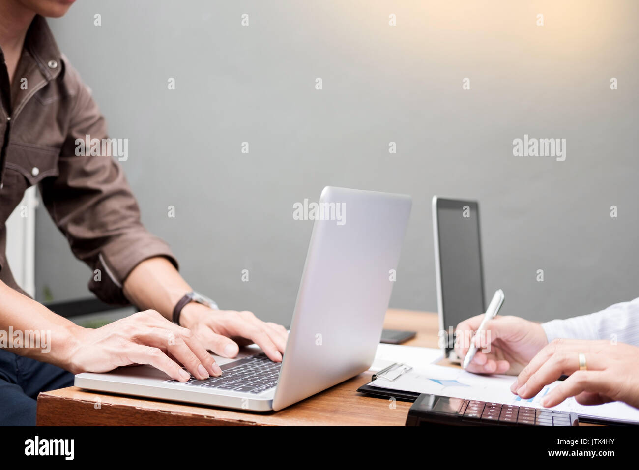 Business meeting  in outdoor. documents account managers crew working with new startup project Idea presentation, analyse marketing plans. Stock Photo