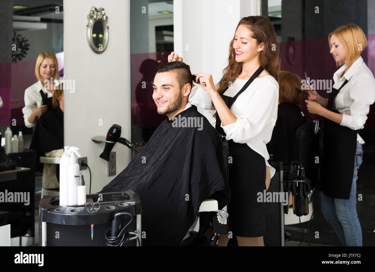 Happy Guy Cuts Hair At The Hair Salon Stock Photo 153011282 Alamy