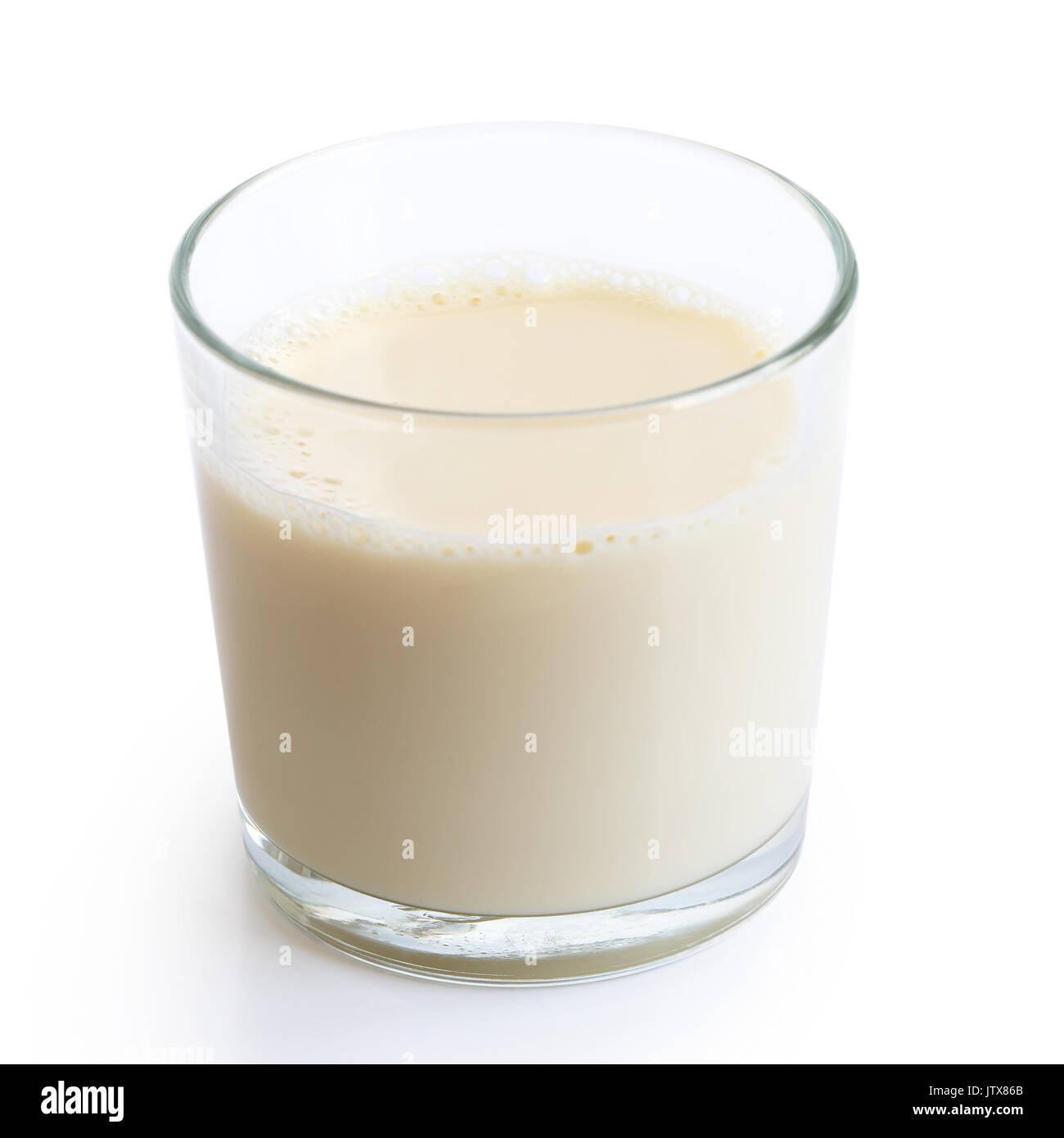 Glass of soya milk with froth isolated on white Stock Photo Alamy
