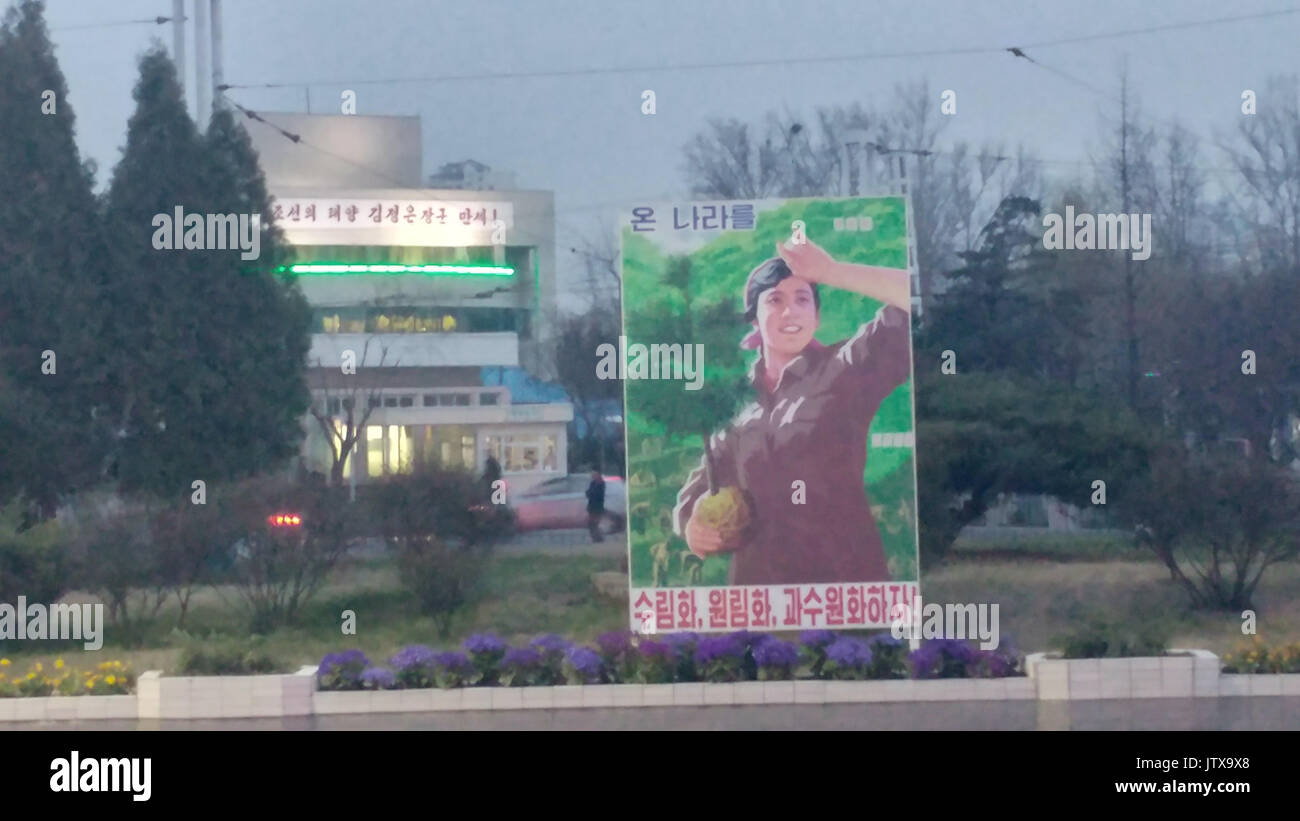 A propaganda poster in Pyongyang / REVEALING IMAGES from the autocratic state of North Korea have helped shed light on the secretive regime’s attitude Stock Photo
