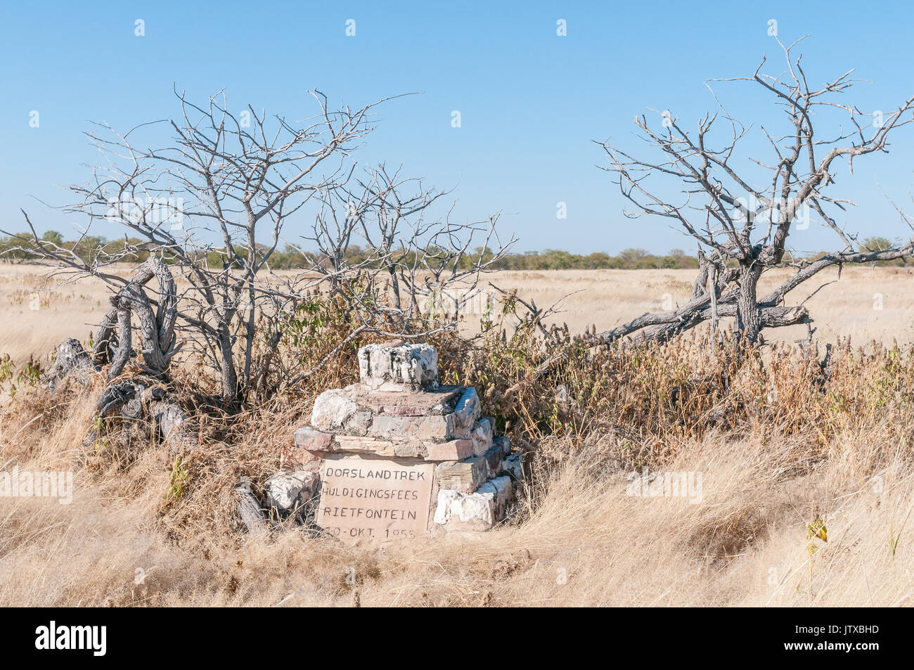 ETOSHA NATIONAL PARK, NAMIBIA - JUNE 22, 2017: A memorial at the Rietfontein Waterhole in the Etosha National Park, to commemorate the Dorsland Trek ( Stock Photo