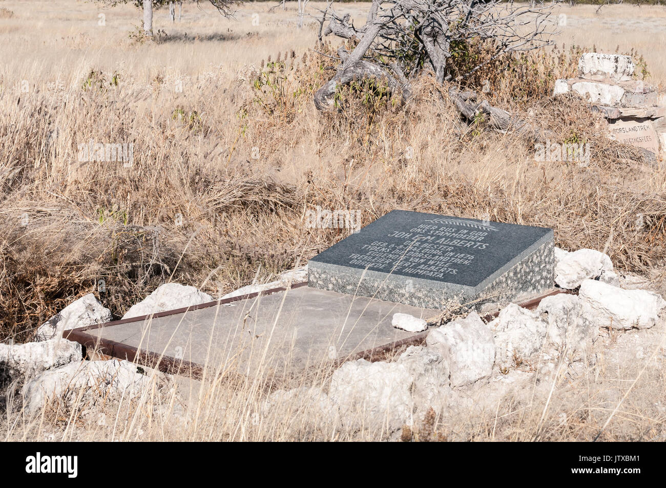 ETOSHA NATIONAL PARK, NAMIBIA - JUNE 22, 2017: Grave at the Rietfontein Waterhole, in the Etosha National Park, of the wife of a leader of the Dorslan Stock Photo