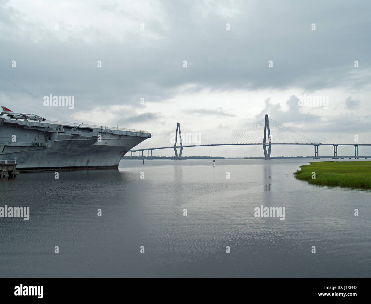 The bow of the USS Yorkton points to the Arthur Ravenel Bridge,Charleston,SC Stock Photo