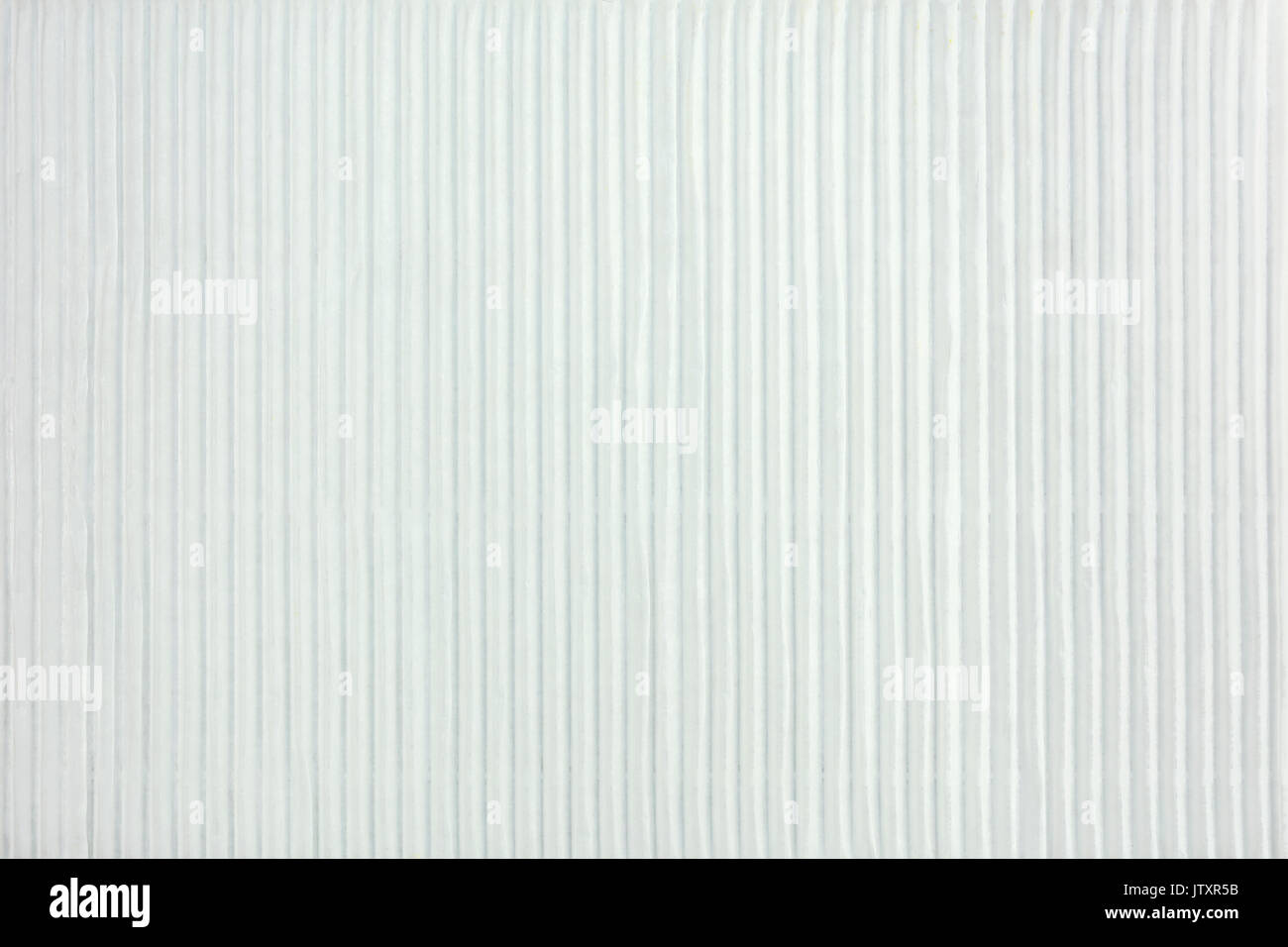 white corrugated striped textured cardboard abstract bright surface background Stock Photo